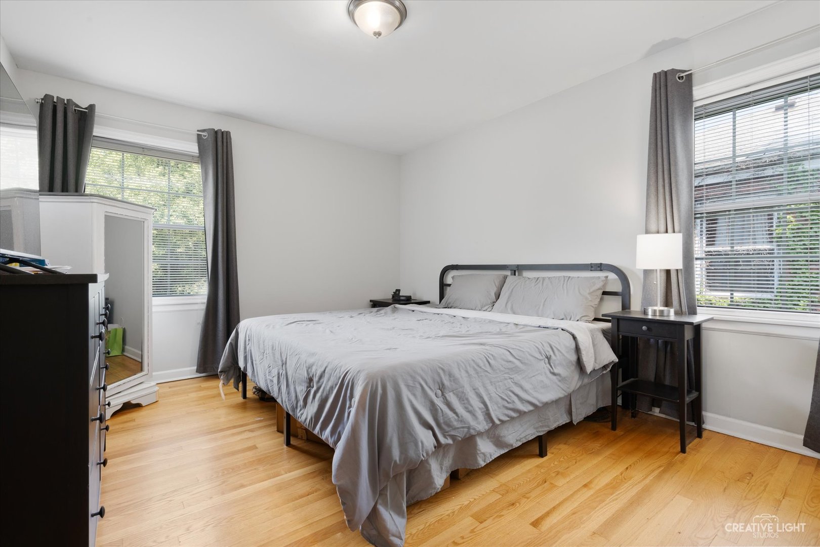 735 East Golf Road Des Plaines, IL 60016 - Photo 14 of 31 a bedroom with a bed and a window