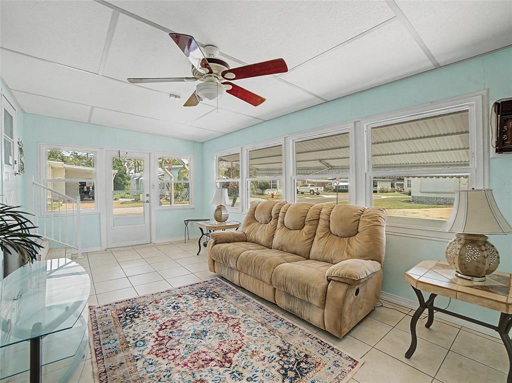 701 Sugar Palm Street Largo, FL 33770 - Photo 22 of 35 a living room with furniture and a window