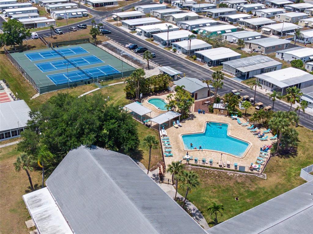 701 Sugar Palm Street Largo, FL 33770 - Photo 30 of 35 an aerial view of a house with a yard and garden