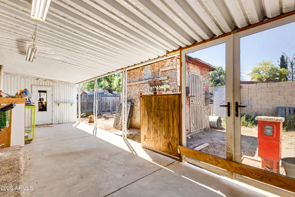 a view of a porch with furniture