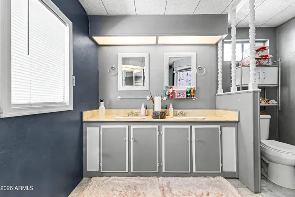 a kitchen with stainless steel appliances granite countertop a sink and a stove