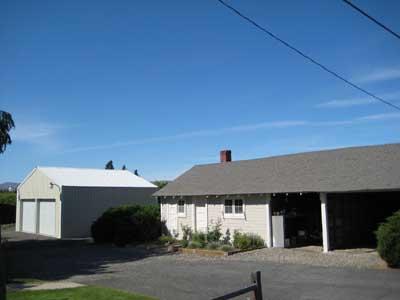 1360 Dilley Road Tieton, WA 98947 - Photo 15 of 23 a front view of a house with a yard