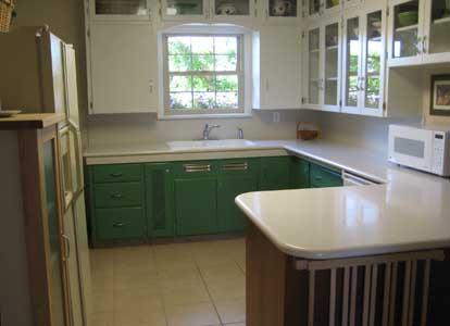 1360 Dilley Road Tieton, WA 98947 - Photo 5 of 23 a kitchen with a sink a window and cabinets