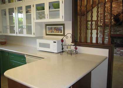 1360 Dilley Road Tieton, WA 98947 - Photo 6 of 23 a kitchen with a table chairs and a refrigerator
