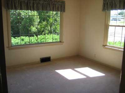 1360 Dilley Road Tieton, WA 98947 - Photo 8 of 23 an empty room with a window