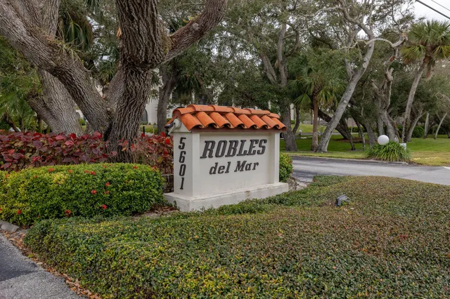 a sign on the side of a road