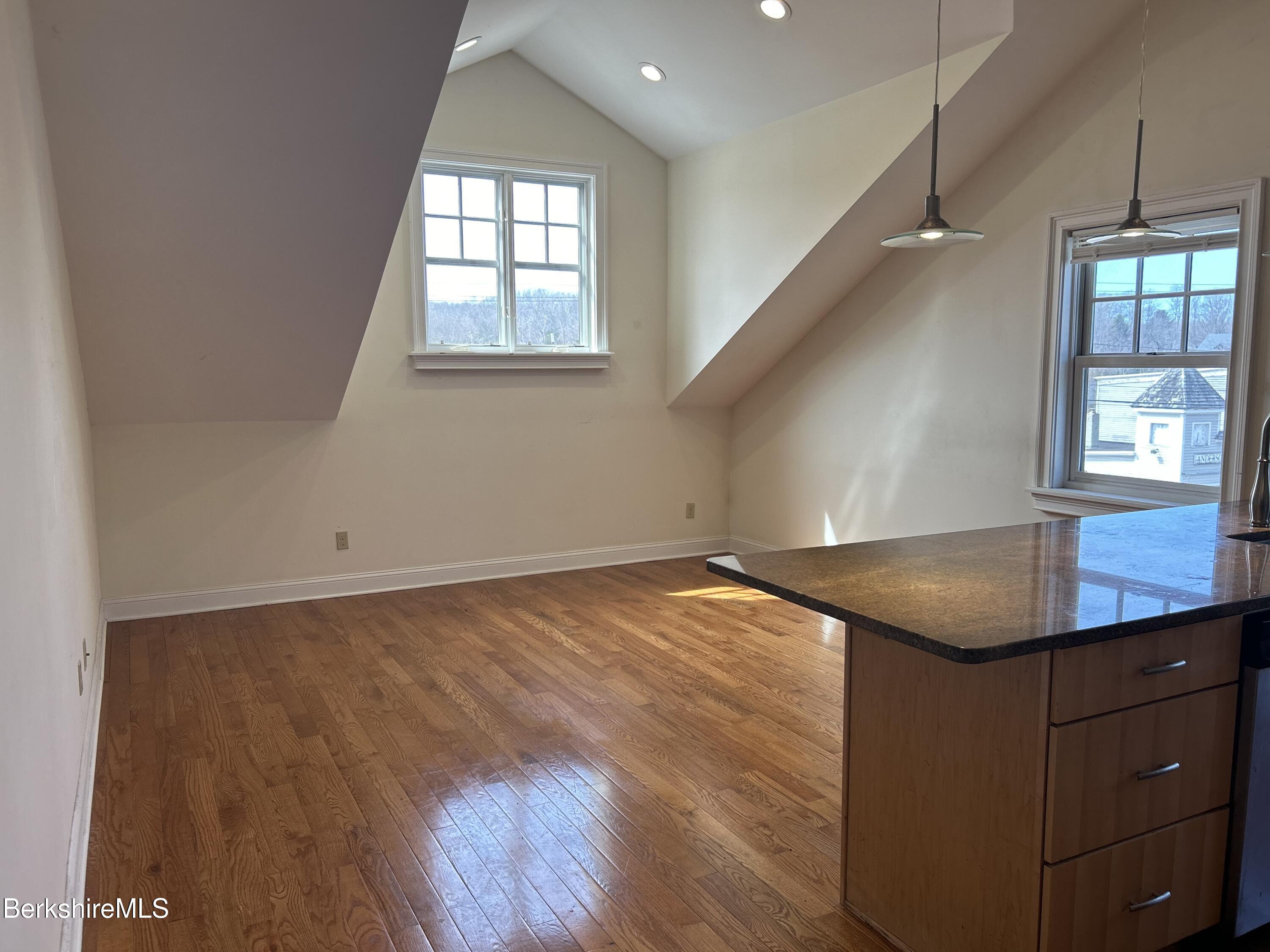 29 Main Street West Stockbridge, MA 01266 - Photo 50 of 51 an empty room with wooden floor and windows