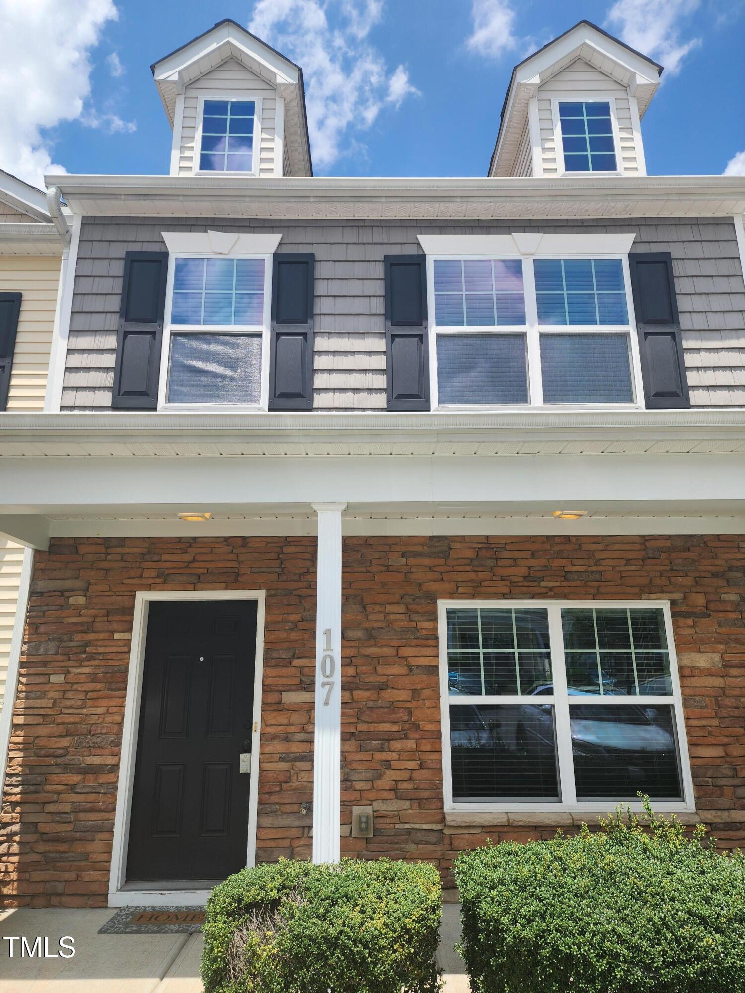 1304-107 Cozart Street, Unit 107 Durham, NC 27704 - Photo 1 of 15 a front view of a house