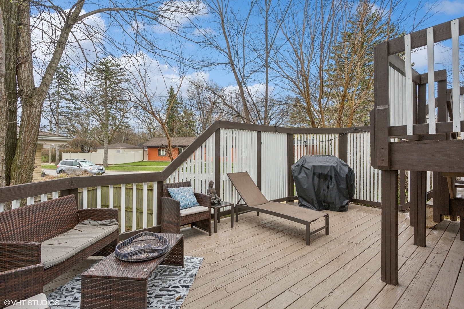 9001 East Prairie Road Evanston, IL 60203 - Photo 17 of 19 a view of balcony with wooden floor and outdoor seating
