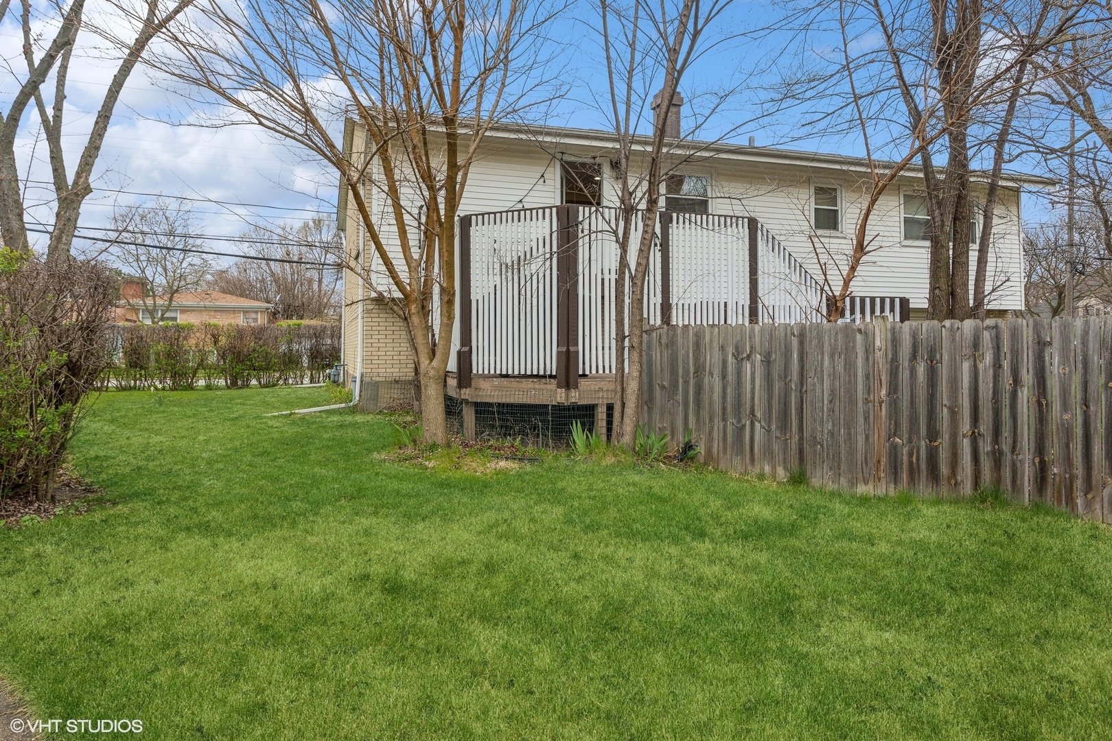 9001 East Prairie Road Evanston, IL 60203 - Photo 19 of 19 a view of a backyard with wooden fence