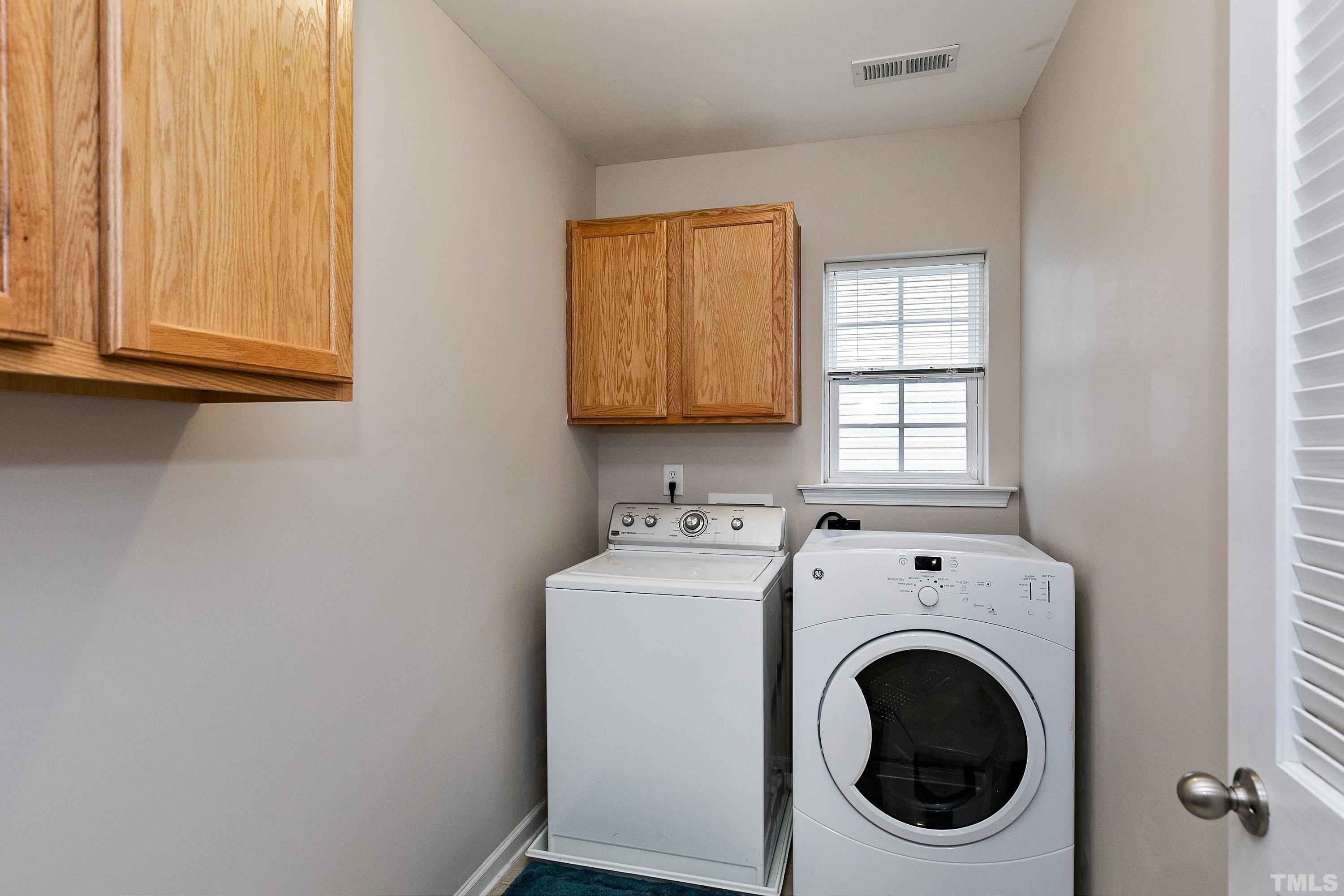 160 Solheim Lane Raleigh, NC 27603 - Photo 24 of 33 a utility room with dryer and washer