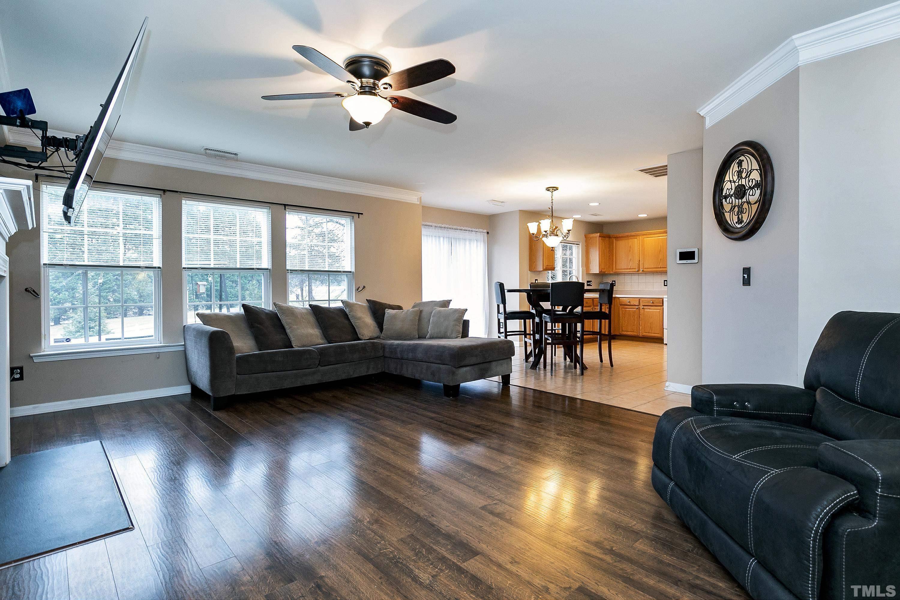 160 Solheim Lane Raleigh, NC 27603 - Photo 7 of 33 a living room with furniture and a large window