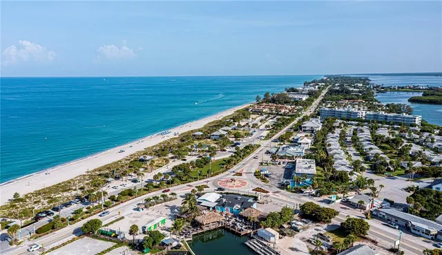 an aerial view of beach and ocean