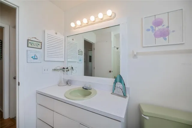 a bathroom with a bathtub and a shower curtain