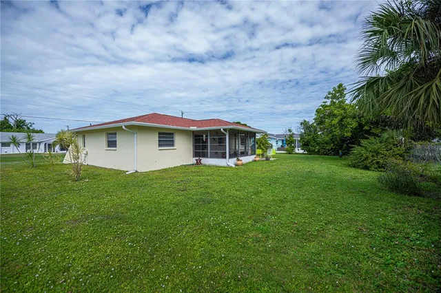 a view of a house with a garden