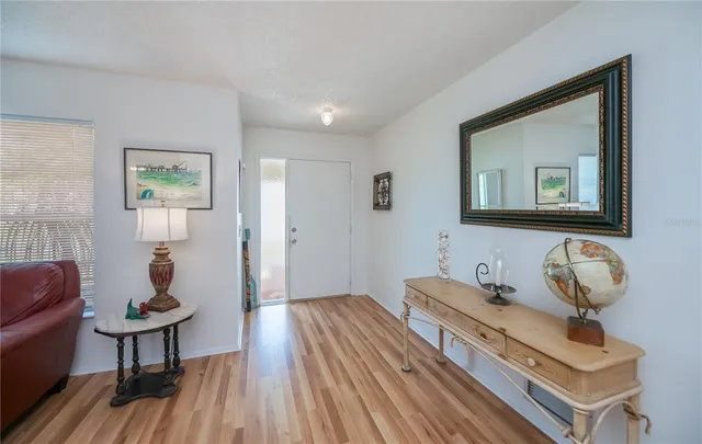 a living room with furniture or couch and a flat screen tv