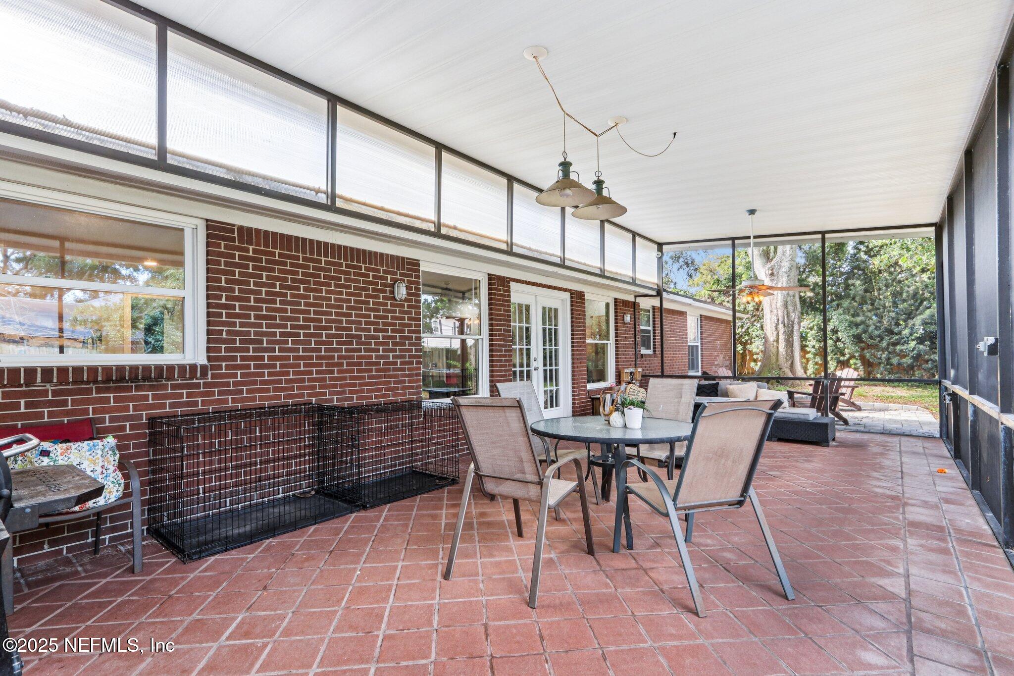 1168 Montevideo Road Jacksonville, FL 32216 - Photo 31 of 38 Screened Patio