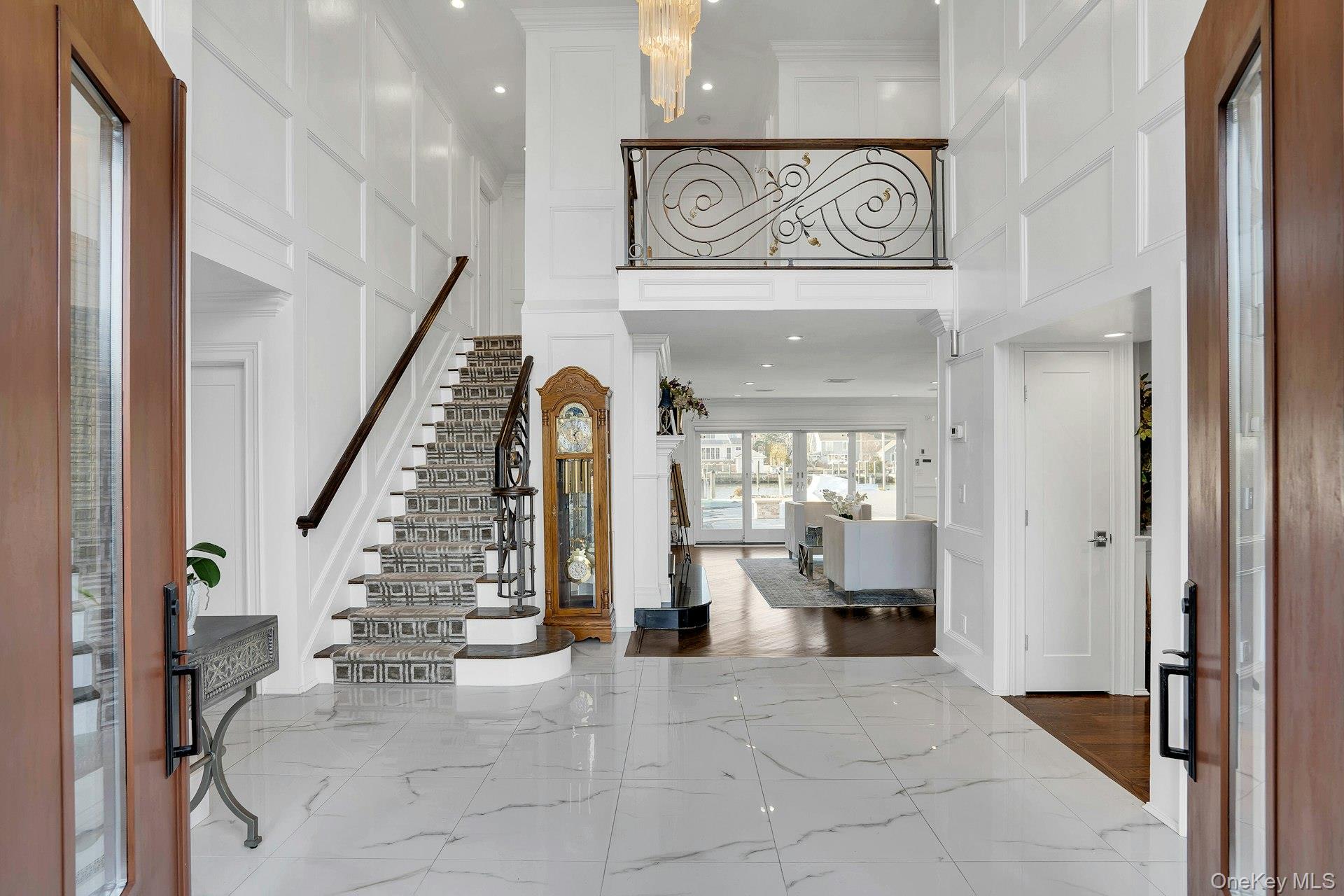 10 Beech Road Islip, NY 11751 - Photo 9 of 49 New Marble flooring and Wainscoting as well as decorative iron railings.