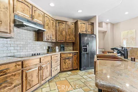 62398 Lilley Road Joshua Tree, CA 92252 - Photo 15 of 70 a kitchen with stainless steel appliances granite countertop a refrigerator and a sink