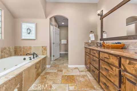 62398 Lilley Road Joshua Tree, CA 92252 - Photo 24 of 70 a bathroom with a tub sink and mirror