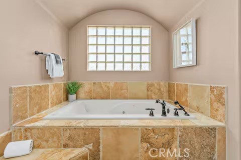 62398 Lilley Road Joshua Tree, CA 92252 - Photo 25 of 70 a bathroom with a bathtub and a window
