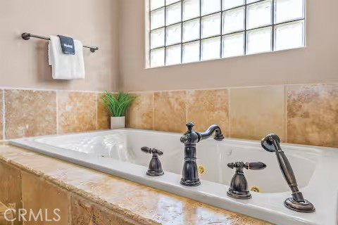 62398 Lilley Road Joshua Tree, CA 92252 - Photo 26 of 70 a bathroom with a sink and a window