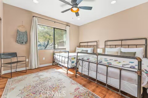 62398 Lilley Road Joshua Tree, CA 92252 - Photo 36 of 70 a bedroom with furniture and window