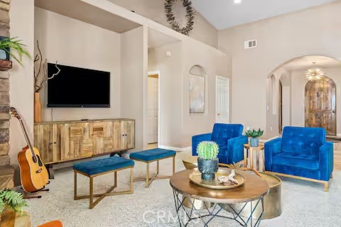 62398 Lilley Road Joshua Tree, CA 92252 - Photo 5 of 70 a living room with furniture and a flat screen tv