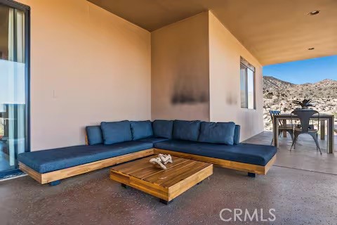 62398 Lilley Road Joshua Tree, CA 92252 - Photo 65 of 70 a living room with furniture and a table