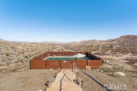62398 Lilley Road Joshua Tree, CA 92252 - Photo 67 of 70 a view of a terrace with a ocean