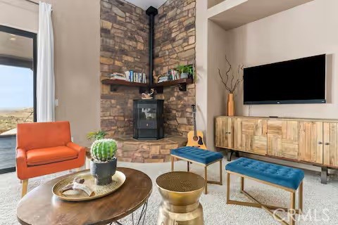 62398 Lilley Road Joshua Tree, CA 92252 - Photo 8 of 70 a living room with furniture and a flat screen tv