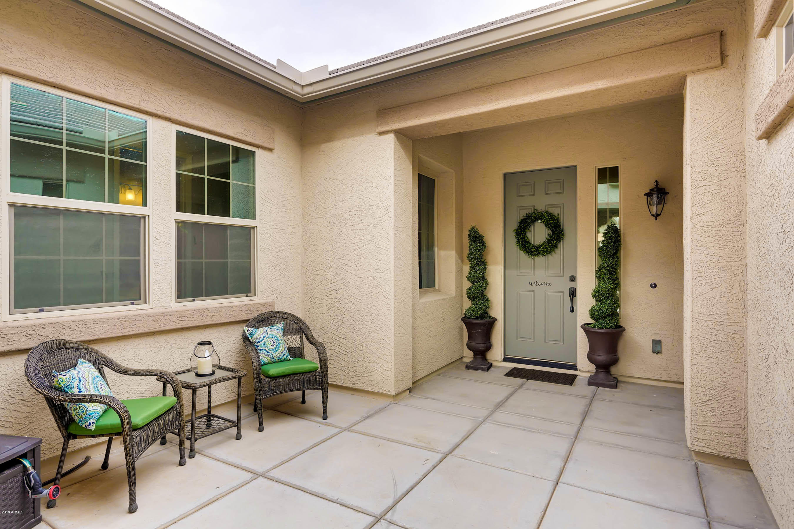 16160 West Berkeley Road Goodyear, AZ 85395 - Photo 3 of 28 Front enclosed patio