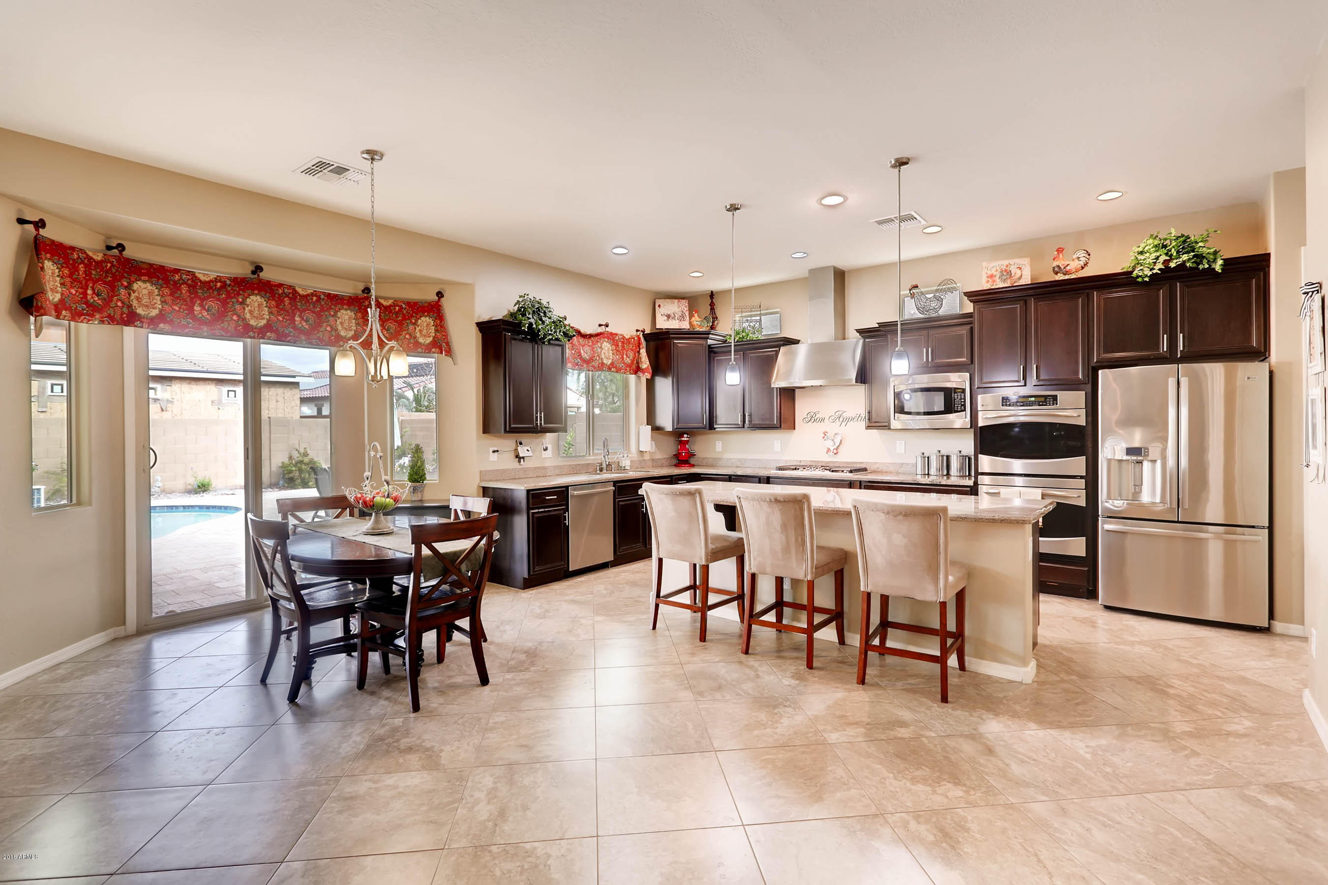 16160 West Berkeley Road Goodyear, AZ 85395 - Photo 5 of 28 Kitchen view from dining room