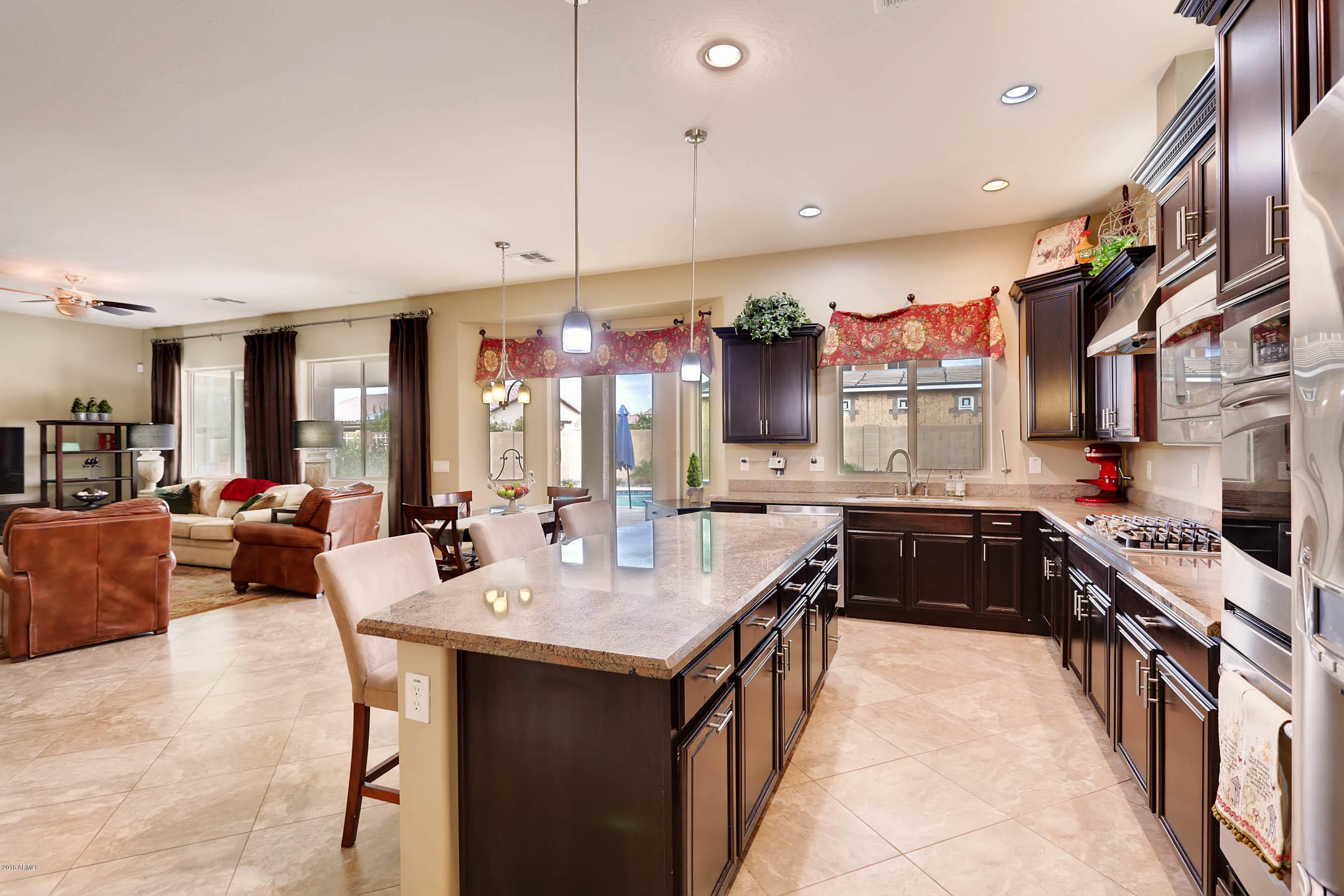 16160 West Berkeley Road Goodyear, AZ 85395 - Photo 9 of 28 Kitchen w/great room view