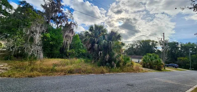 a view of swimming pool with a yard