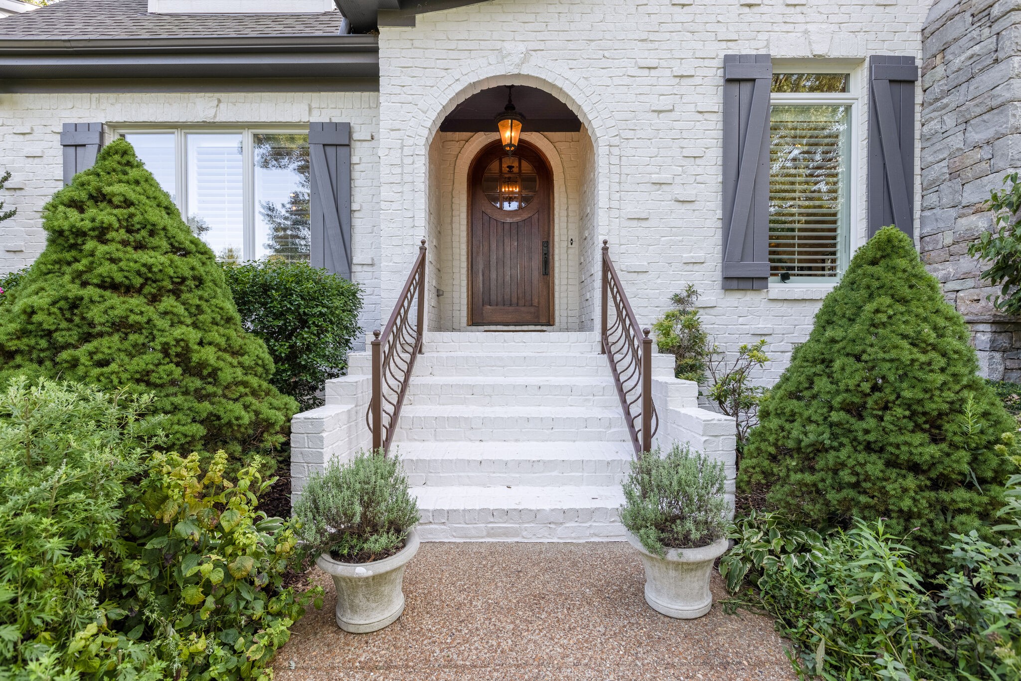 3151 McMillan Road Franklin, TN 37064 - Photo 12 of 46 a front view of a house with plants