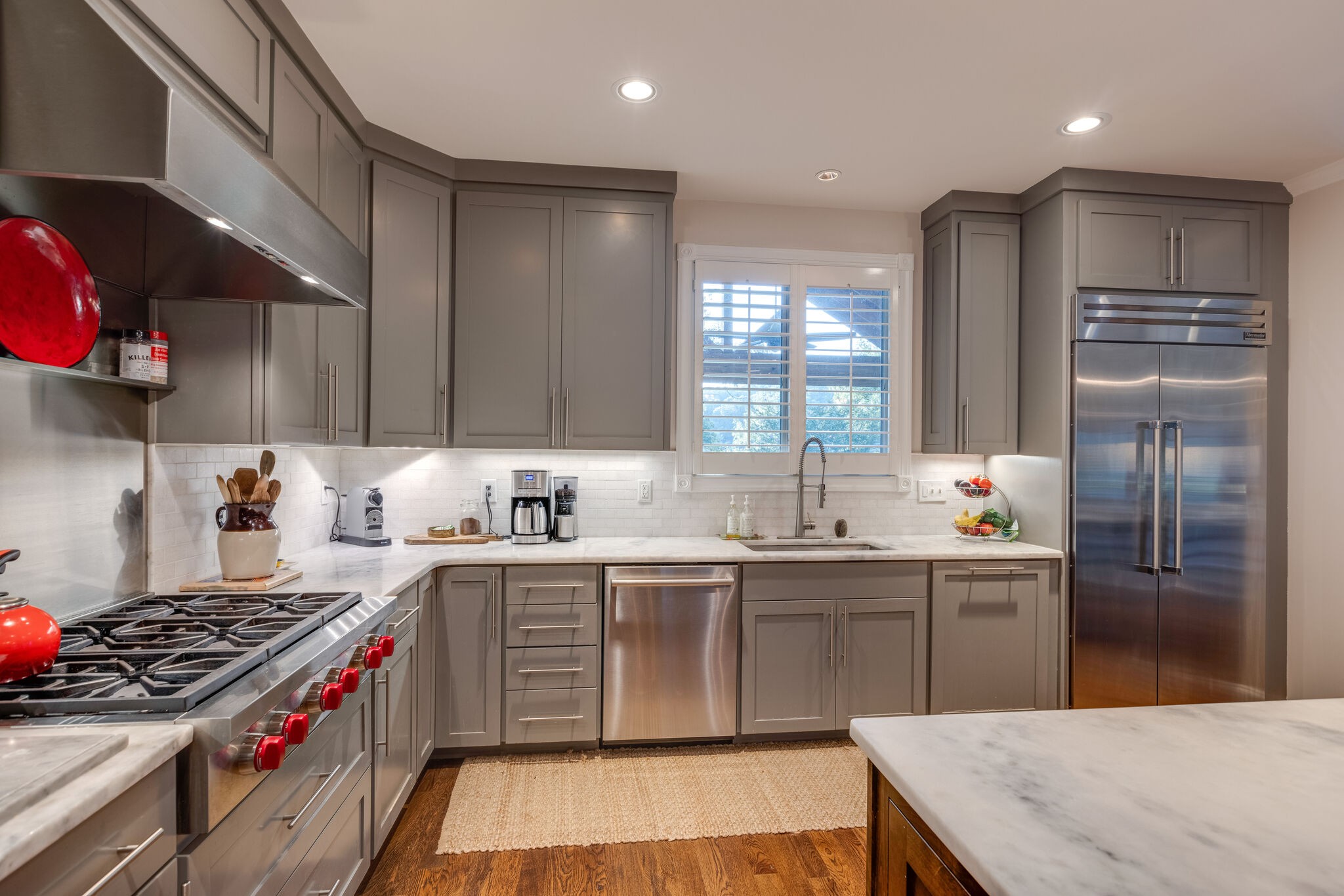 3151 McMillan Road Franklin, TN 37064 - Photo 22 of 46 a kitchen with stainless steel appliances a sink stove and cabinets