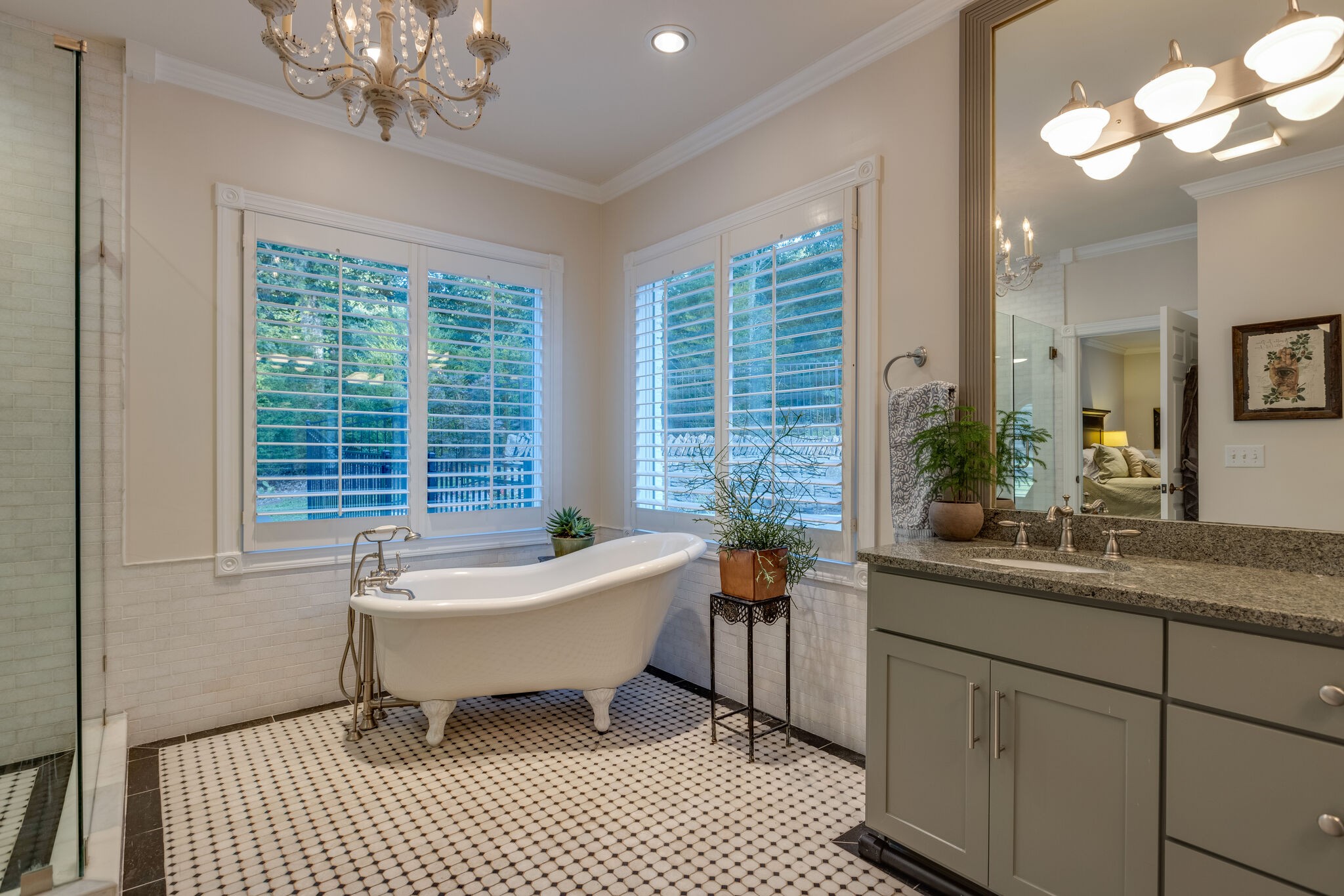 3151 McMillan Road Franklin, TN 37064 - Photo 28 of 46 a spacious bathroom with a sink a toilet a mirror a window and vanity