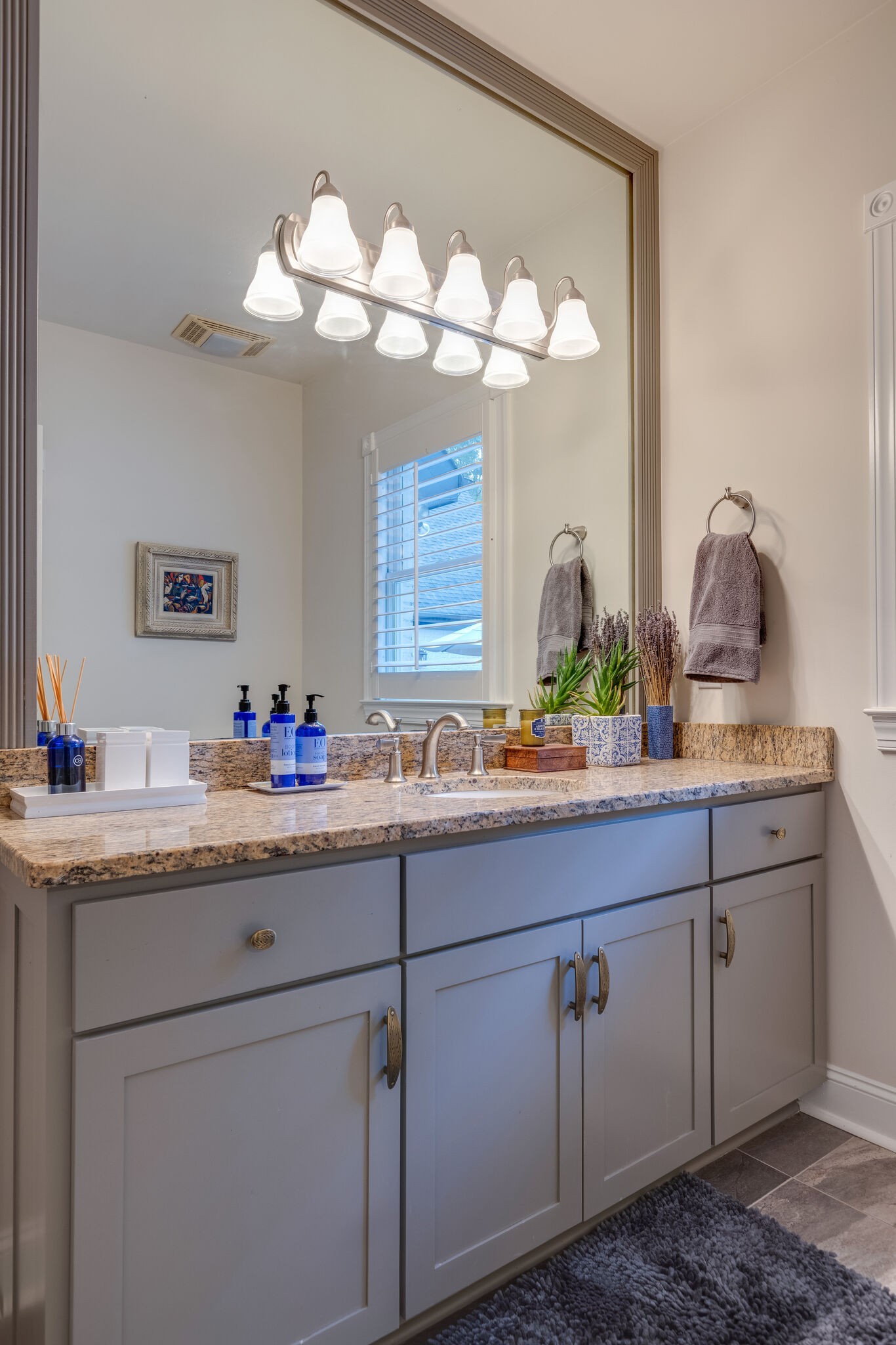 3151 McMillan Road Franklin, TN 37064 - Photo 32 of 46 a bathroom with cabinets and mirror