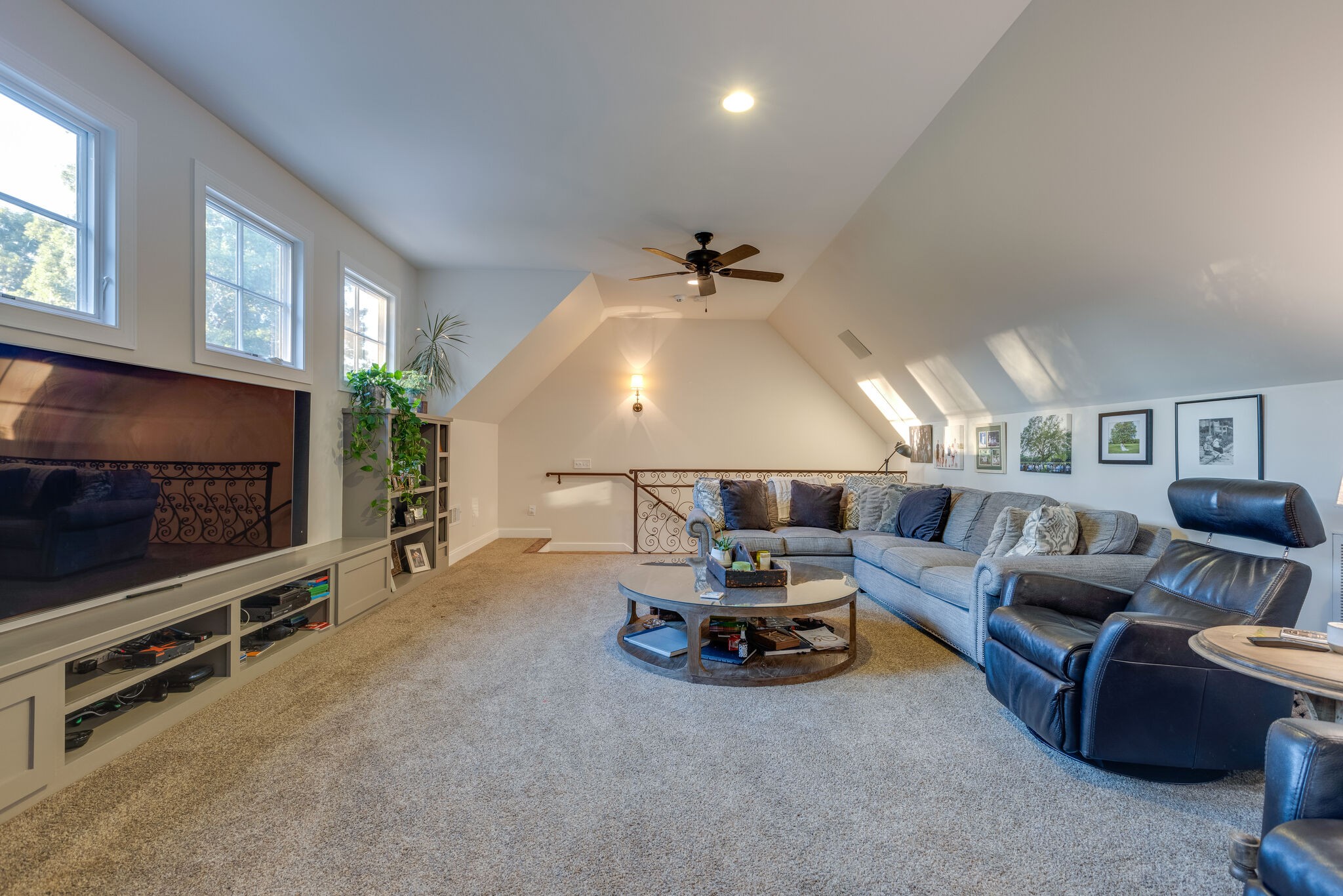 3151 McMillan Road Franklin, TN 37064 - Photo 39 of 46 a living room with furniture gym equipment and a flat screen tv