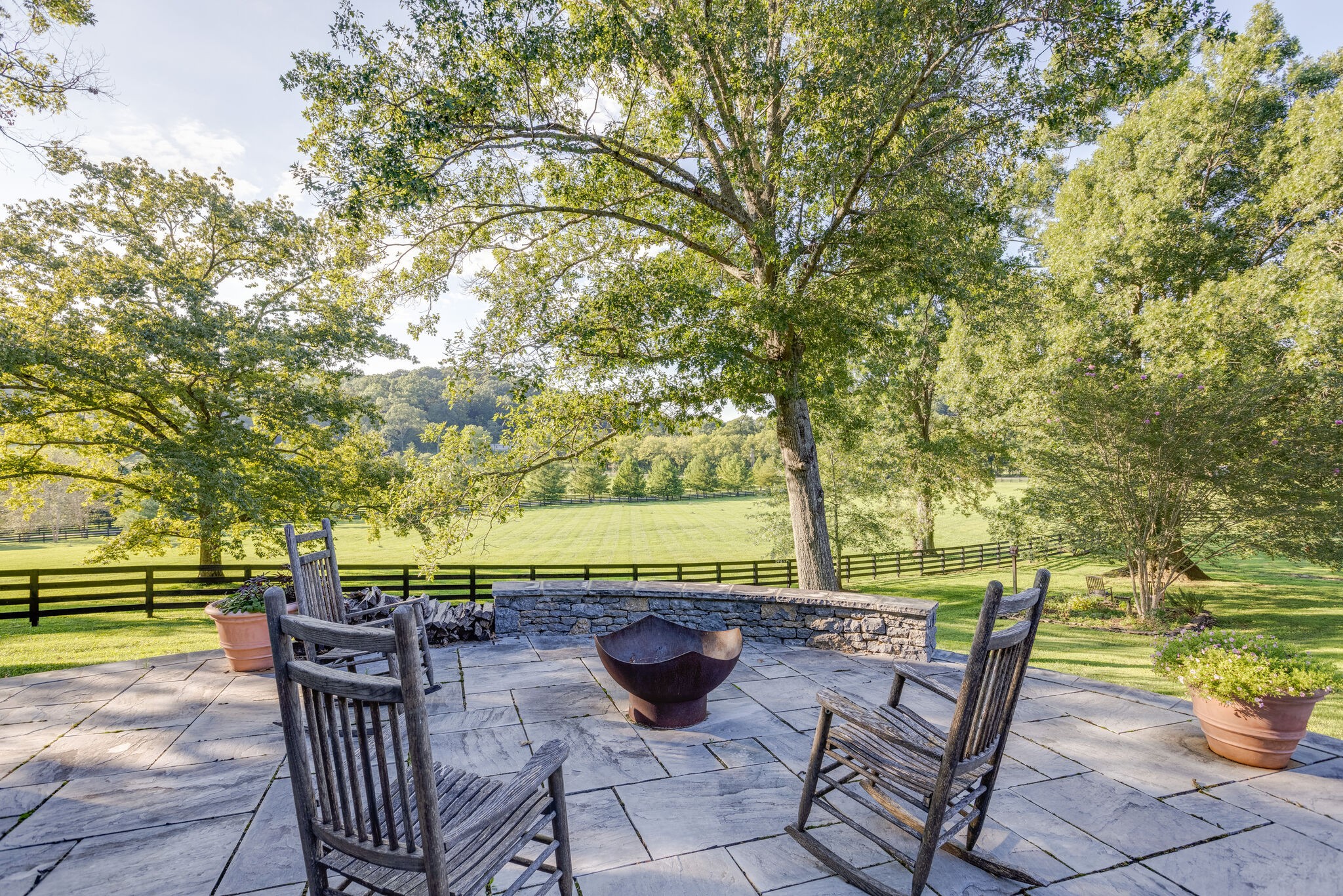 3151 McMillan Road Franklin, TN 37064 - Photo 44 of 46 a view of a chairs and table in the patio with a fire pit