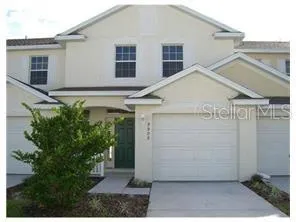 a view of a house with garage