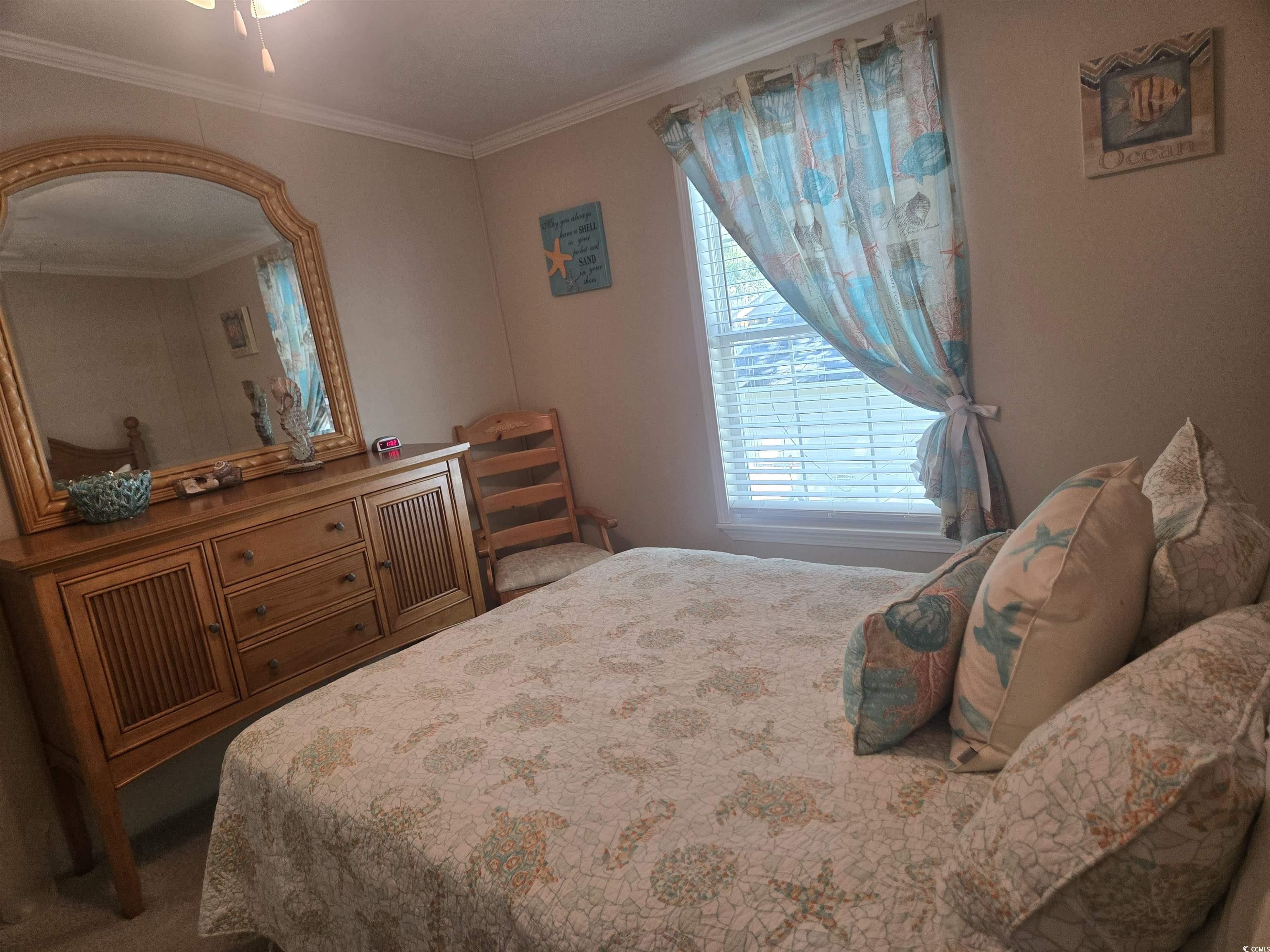 337 Clam Shell Circle Murrells Inlet, SC 29576 - Photo 20 of 29 Bedroom featuring ornamental molding and carpet flooring