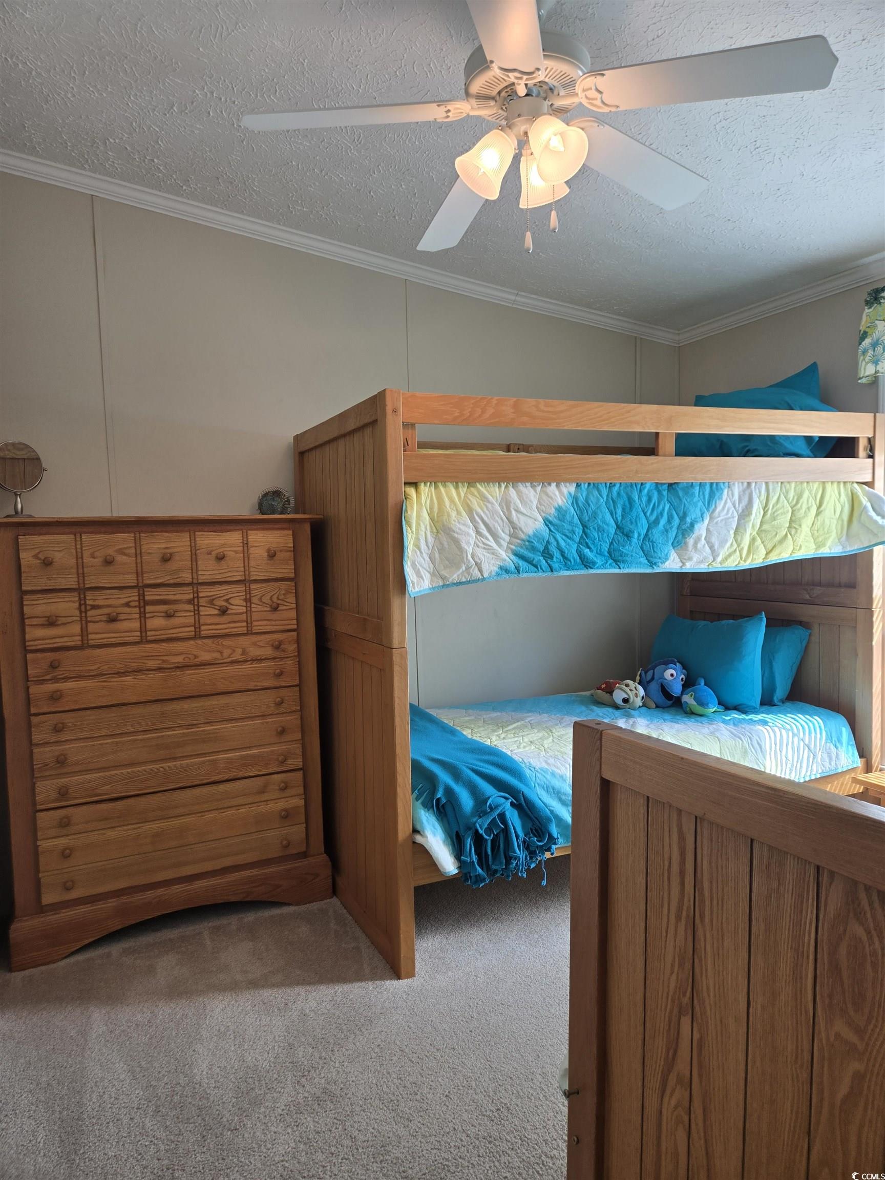 337 Clam Shell Circle Murrells Inlet, SC 29576 - Photo 22 of 29 Carpeted bedroom with a textured ceiling, a ceiling fan, and ornamental molding