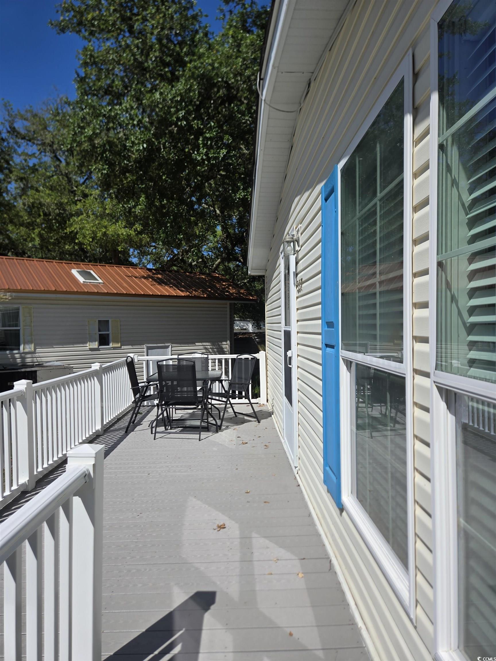 337 Clam Shell Circle Murrells Inlet, SC 29576 - Photo 3 of 29 Deck with outdoor dining area