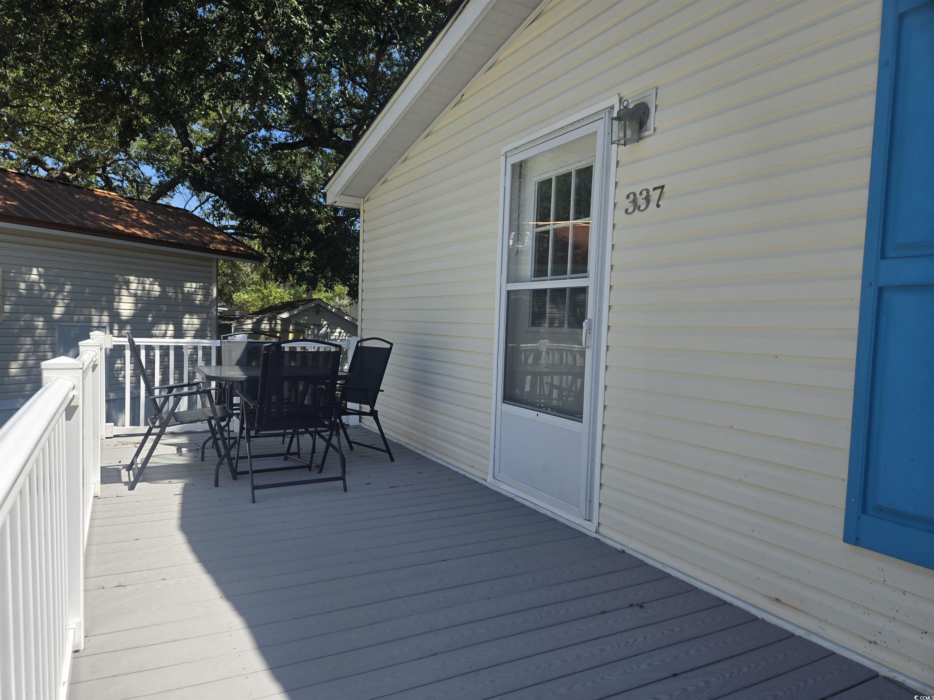 337 Clam Shell Circle Murrells Inlet, SC 29576 - Photo 4 of 29 Deck featuring outdoor dining space