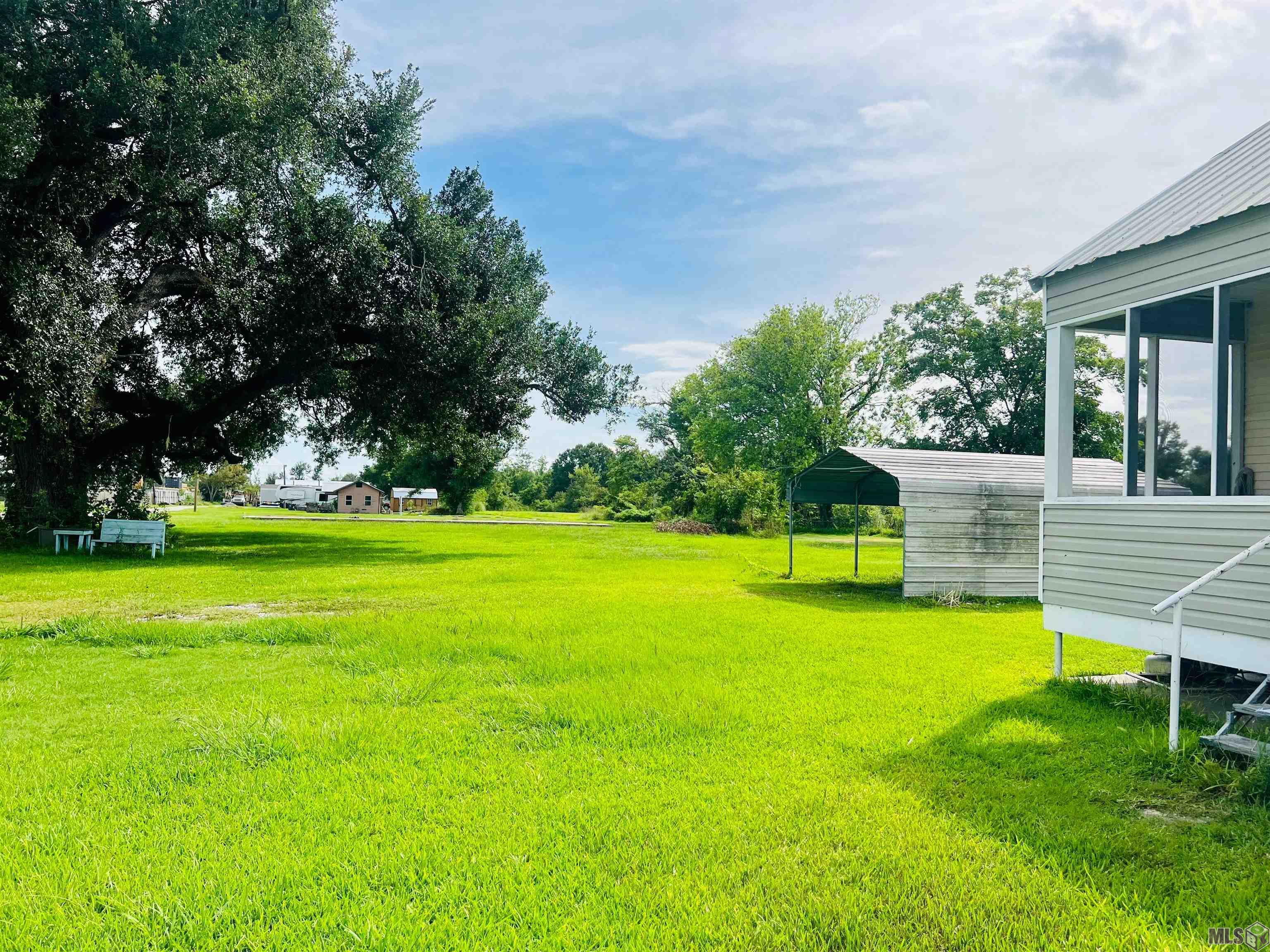 2015 Bayou Blue Road Houma, LA 70364 - Photo 3 of 14 Side/Back View