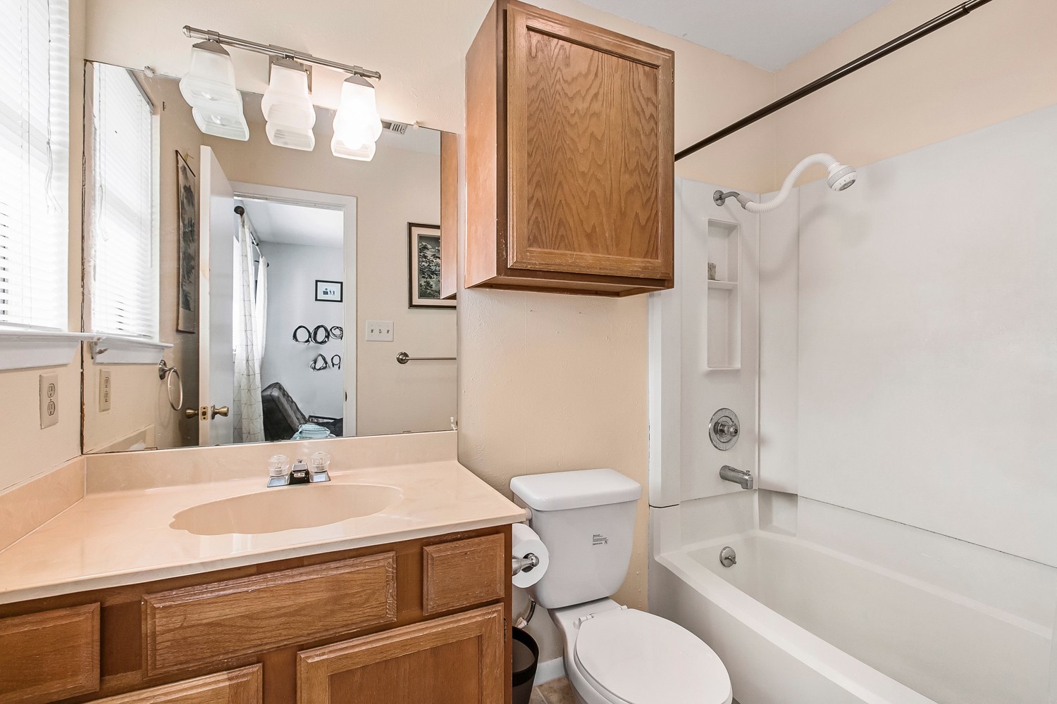 6029 Old Fredericksburg Road, Unit A Austin, TX 78749 - Photo 4 of 20 a bathroom with a sink toilet and shower
