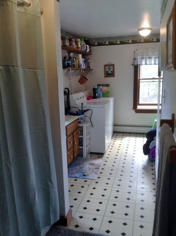 69 East Main Street Rindge, NH 03461 - Photo 15 of 27 a room with storage and utility