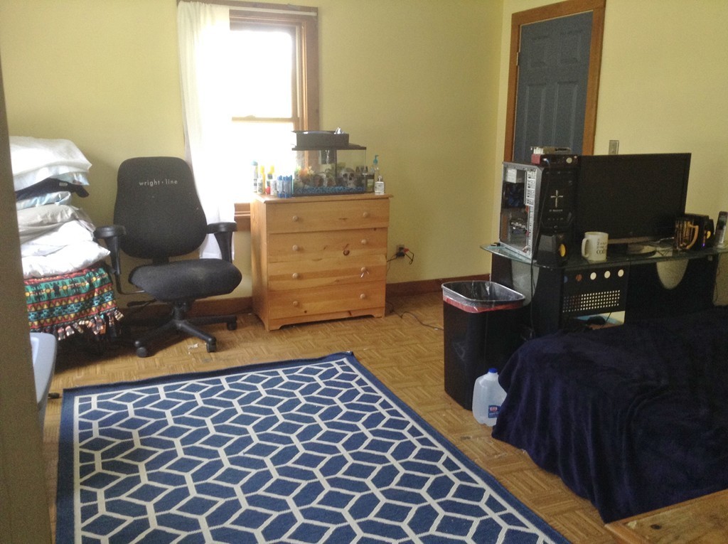 69 East Main Street Rindge, NH 03461 - Photo 19 of 27 a living room with furniture and a window